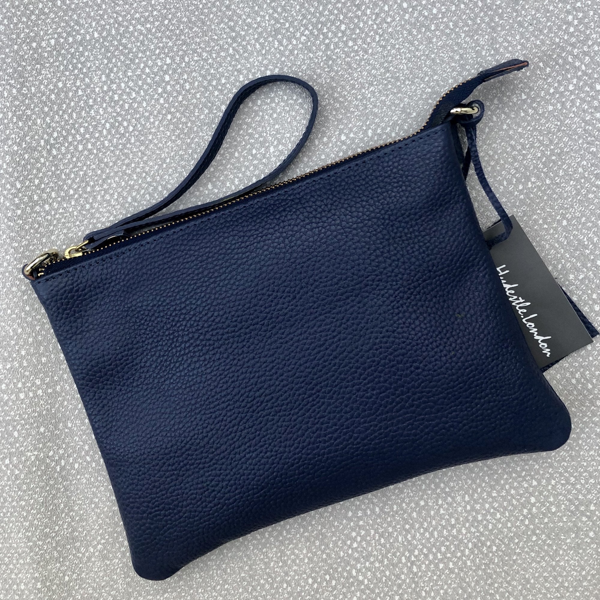 MEGAN PEBBLED LEATHER WRISTLET CLUTCH BAG | Variety of colours